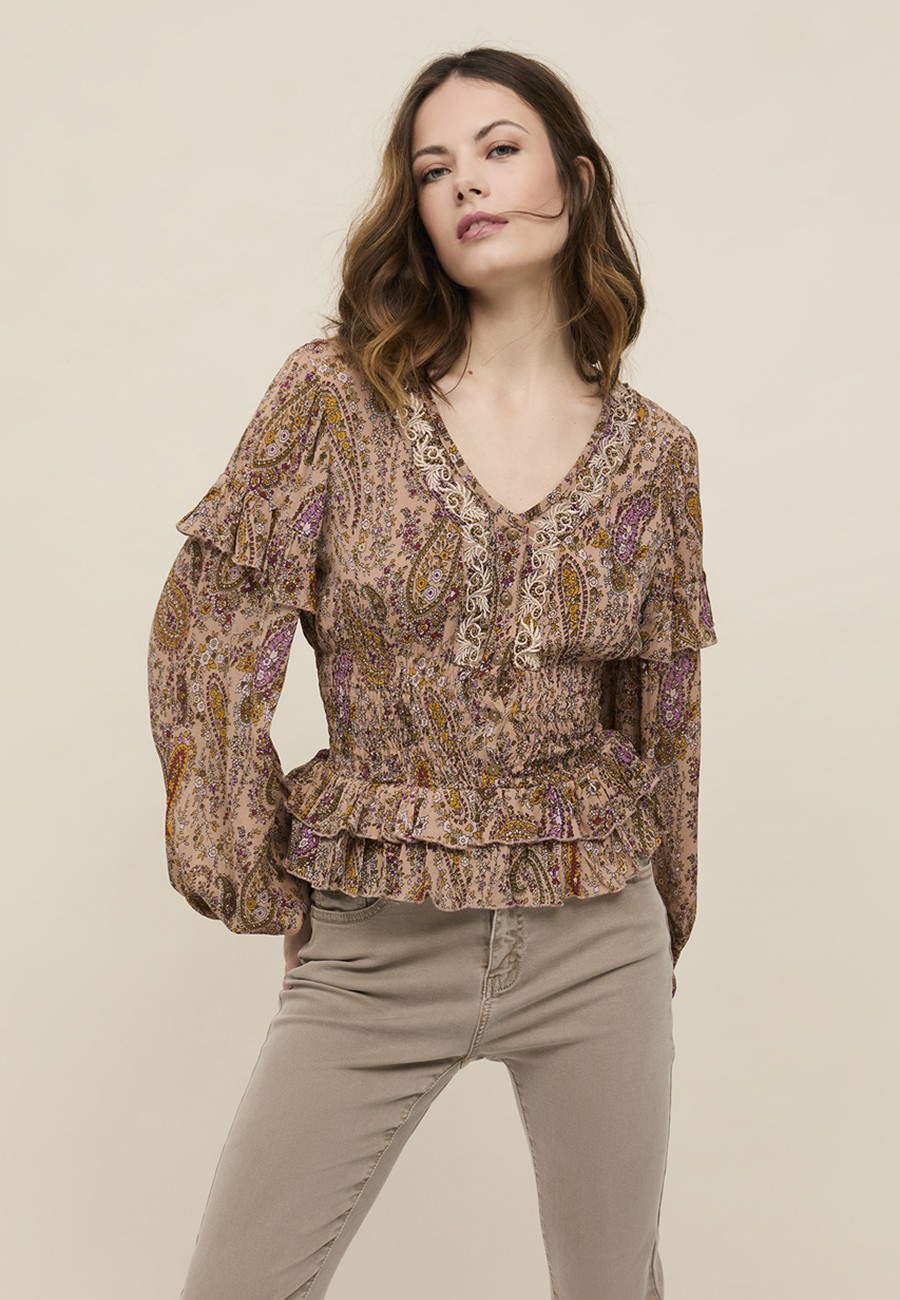 BLUSA DE GASA CON ESTAMPADO...