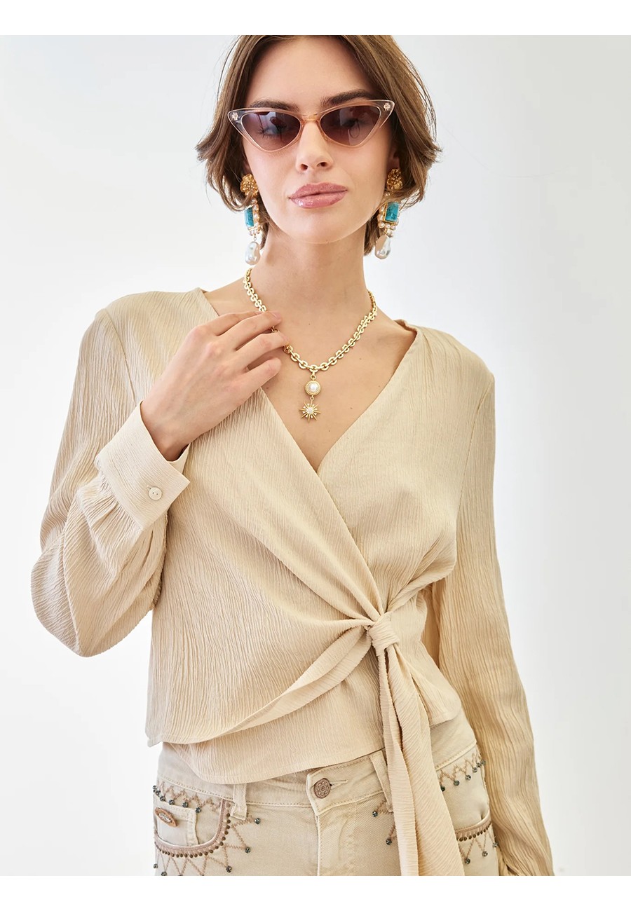 BLUSA TENCEL CON ANUDADO EN...